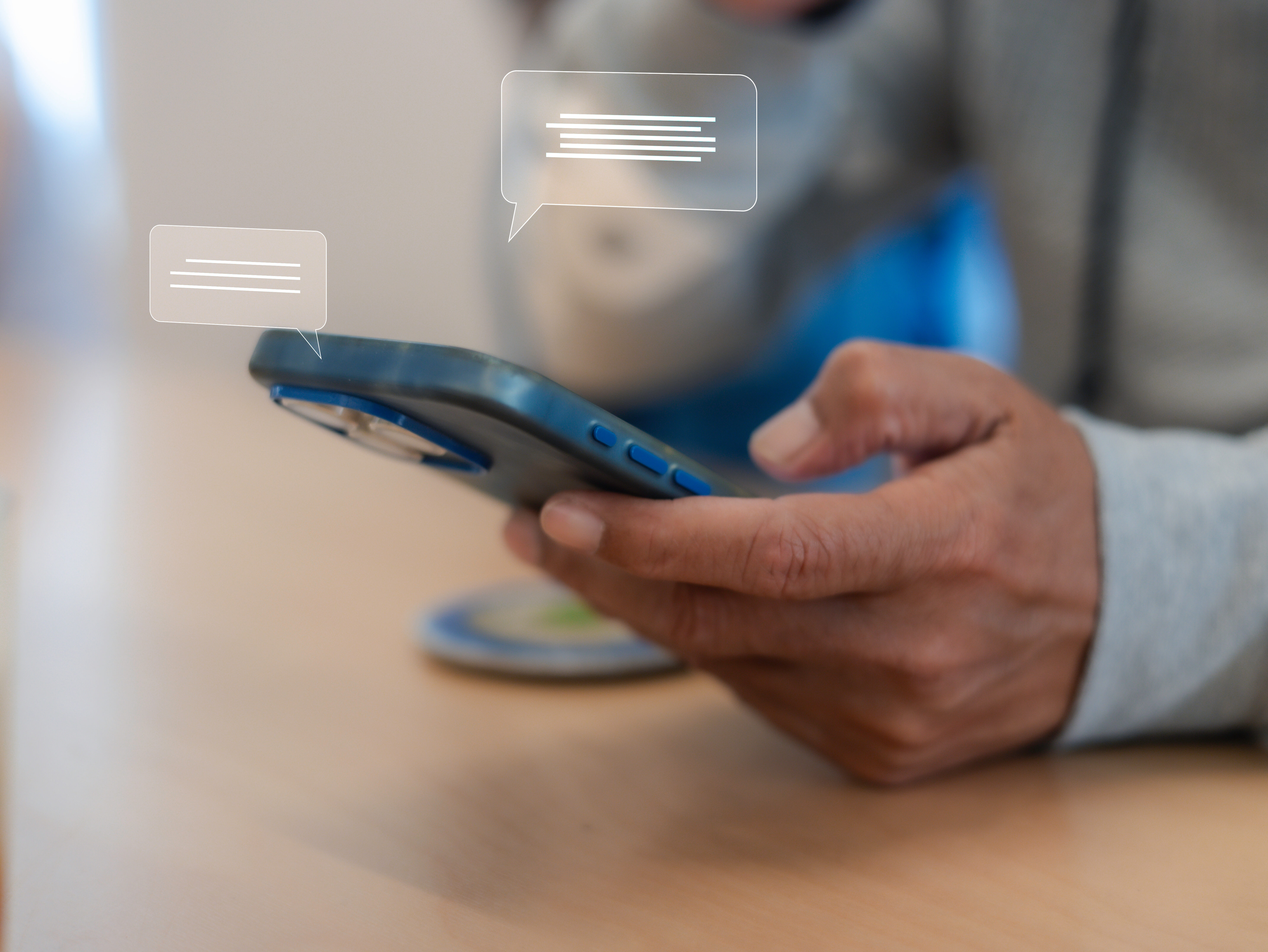 Close up man using smart phone, Social media marketing concept. hand using smartphone typing, chatting conversation in chat box icons pop up