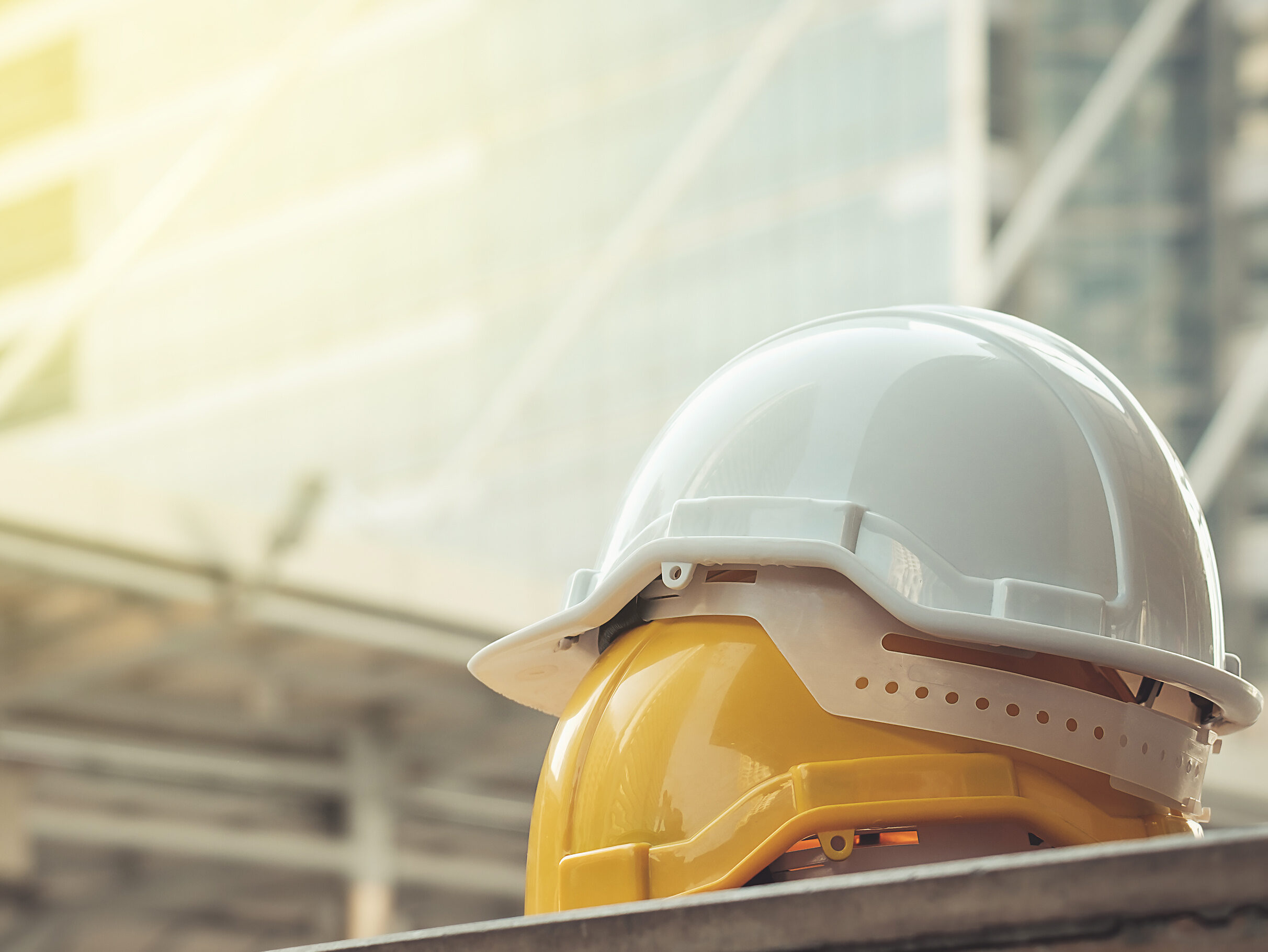 white, yellow hard safety helmet hat for safety project of workm